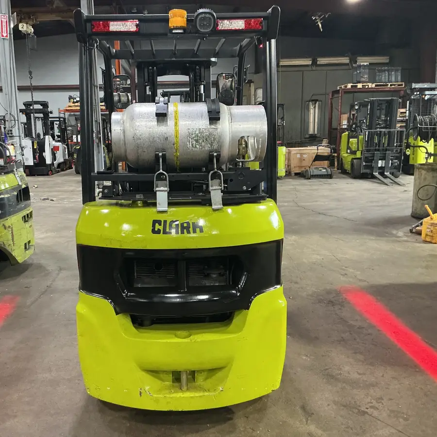 Used Clark S25L LP forklift, rear view with LP tank
